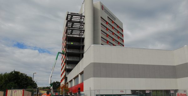 Exterior construction and steel scaffolding on the Ohio State University Wexner Medical Center building